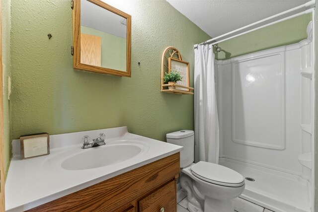 2400 Ridgetop Cir, Ames, IA 50014 - full bathroom with a textured wall, vanity, and curtained shower