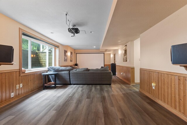 2400 Ridgetop Cir, Ames, IA 50014 - living area featuring a wainscoted wall, wood walls, and wood finished floors