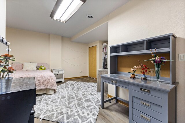 2400 Ridgetop Cir, Ames, IA 50014 - bedroom with wood finished floors and baseboards
