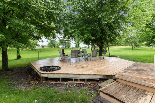 2400 Ridgetop Cir, Ames, IA 50014 - wooden terrace with a yard, outdoor dining area, and a fire pit