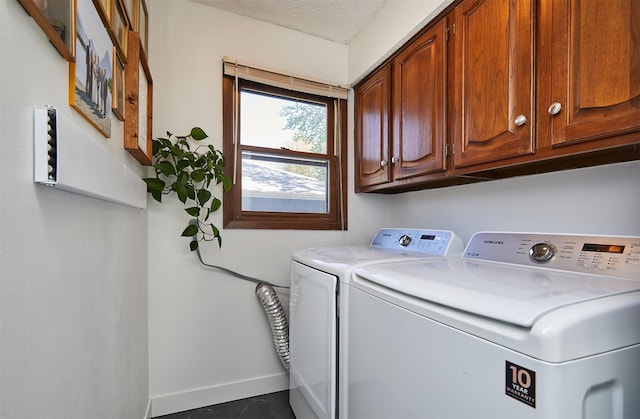 5208 Pommel Pl, West Des Moines, IA 50265 - laundry area with washer and clothes dryer, cabinet space, and tile patterned floors