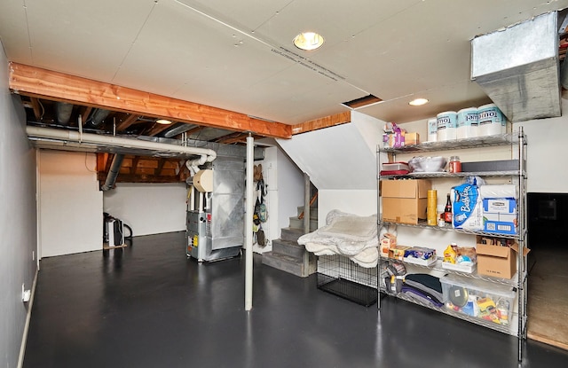 5208 Pommel Pl, West Des Moines, IA 50265 - basement featuring heating unit, stairway, and recessed lighting