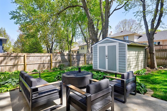 5208 Pommel Pl, West Des Moines, IA 50265 - fenced backyard featuring a storage unit, a patio, and an outdoor living space