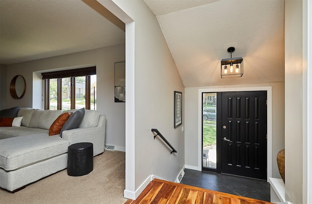 5208 Pommel Pl, West Des Moines, IA 50265 - foyer featuring wood finished floors and a textured ceiling