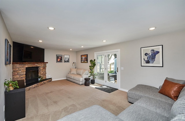 5208 Pommel Pl, West Des Moines, IA 50265 - carpeted living area with recessed lighting and a stone fireplace