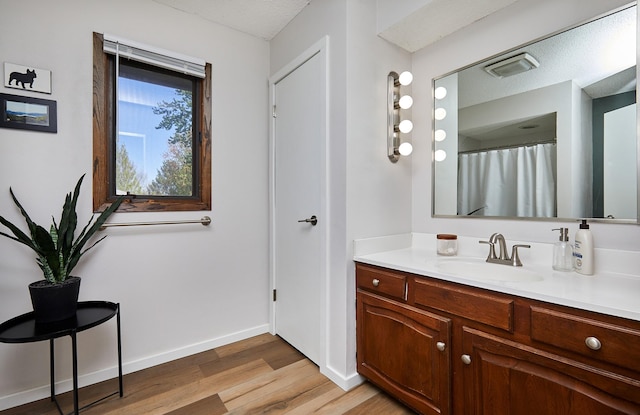 5208 Pommel Pl, West Des Moines, IA 50265 - full bathroom featuring wood finished floors and vanity