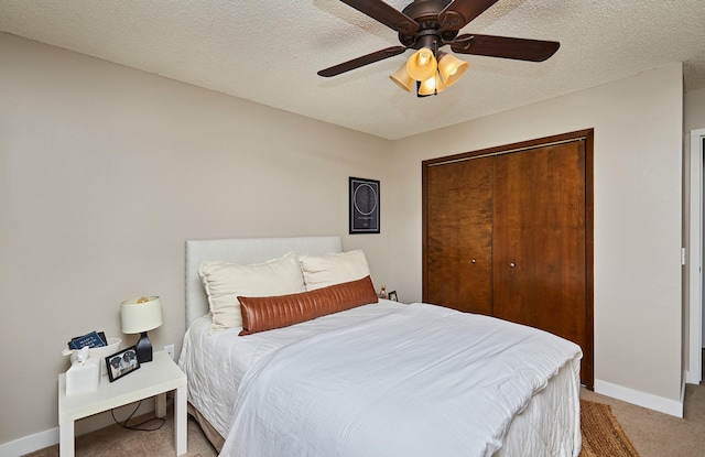 5208 Pommel Pl, West Des Moines, IA 50265 - bedroom featuring light carpet, a closet, a ceiling fan, and a textured ceiling