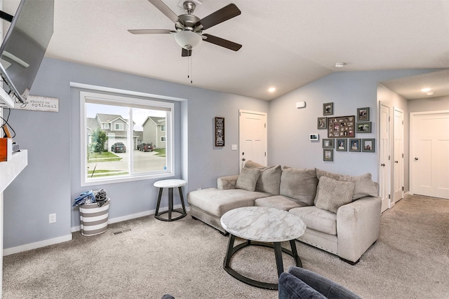 1115 Locust St, Waukee, IA 50263 - carpeted living room featuring ceiling fan and vaulted ceiling