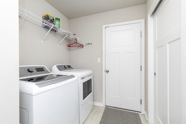 1115 Locust St, Waukee, IA 50263 - laundry room with washer and clothes dryer