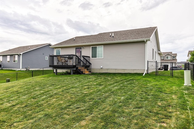 1115 Locust St, Waukee, IA 50263 - back of property with a gate, a deck, a fenced backyard, and stairway