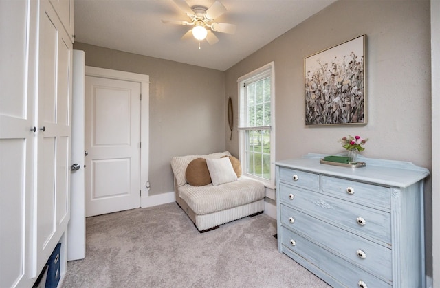 951 28th St, Des Moines, IA 50312 - sitting room with light colored carpet and a ceiling fan