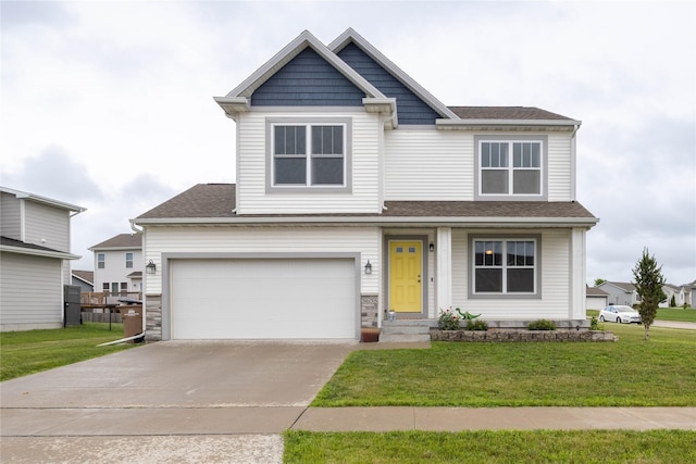 3635 Linden Dr SW, Bondurant, IA 50035 - view of front of house featuring a front lawn, driveway, a shingled roof, and an attached garage