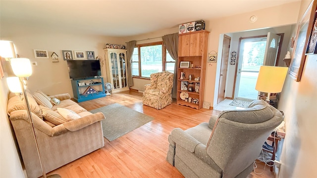 1448 17th St, West Des Moines, IA 50265 - living area with light wood-type flooring