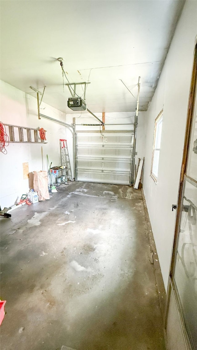 1448 17th St, West Des Moines, IA 50265 - garage featuring a garage door opener
