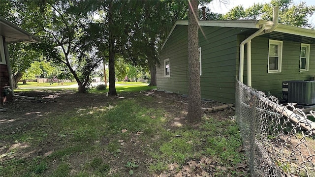 1448 17th St, West Des Moines, IA 50265 - view of property exterior featuring a central AC unit