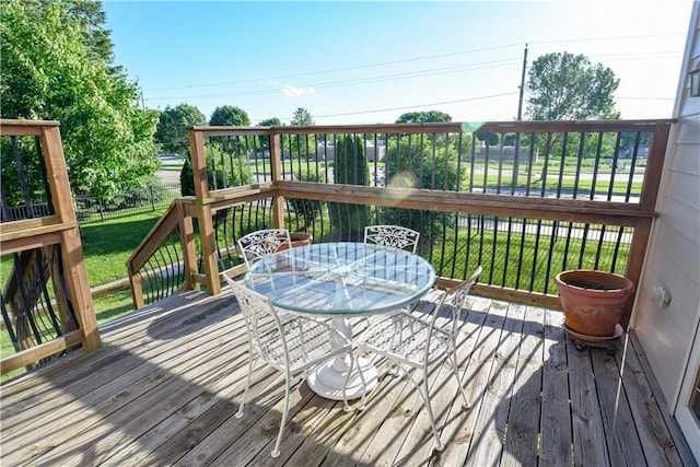 1699 Glade Dr SW, Altoona, IA 50009 - deck with outdoor dining space and a fenced backyard