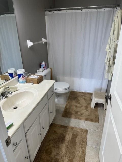 4017 160th St, Urbandale, IA 50323 - full bathroom featuring vanity, tile patterned floors, and curtained shower