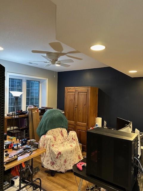 4017 160th St, Urbandale, IA 50323 - office space with wood finished floors, a ceiling fan, and recessed lighting