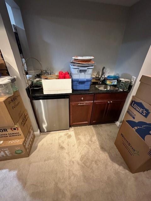 4017 160th St, Urbandale, IA 50323 - kitchen with light carpet and fridge
