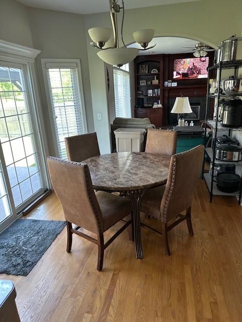 4017 160th St, Urbandale, IA 50323 - dining room with wood finished floors and ceiling fan
