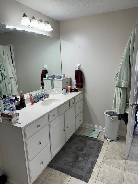 4017 160th St, Urbandale, IA 50323 - bathroom with vanity and tile patterned floors