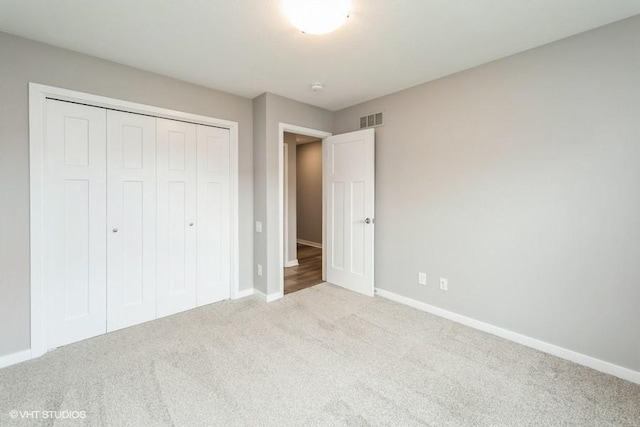 112 Hickory Way, Polk City, IA 50226 - unfurnished bedroom with carpet floors and a closet