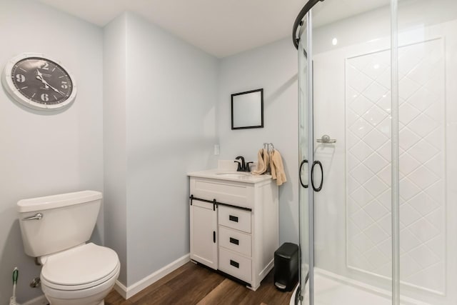 310 SE 3rd St, Panora, IA 50216 - full bathroom with wood finished floors, vanity, and a shower stall