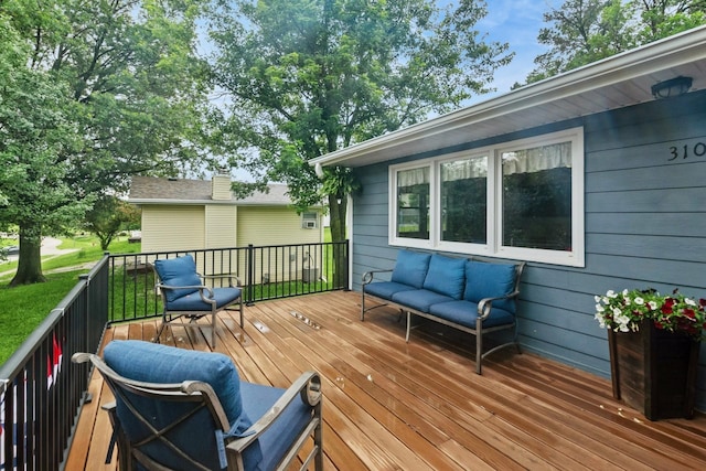 310 SE 3rd St, Panora, IA 50216 - wooden terrace with an outdoor living space