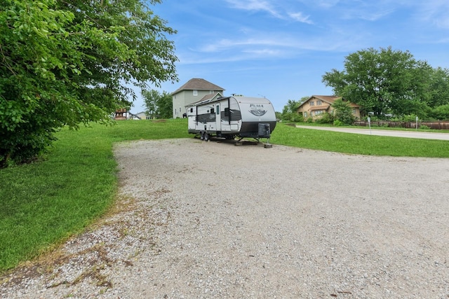 310 SE 3rd St, Panora, IA 50216 - view of front of property with gravel driveway and a front yard