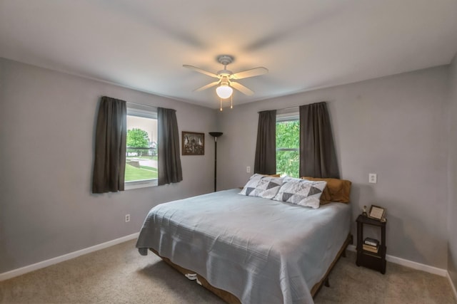 310 SE 3rd St, Panora, IA 50216 - bedroom with carpet floors and a ceiling fan
