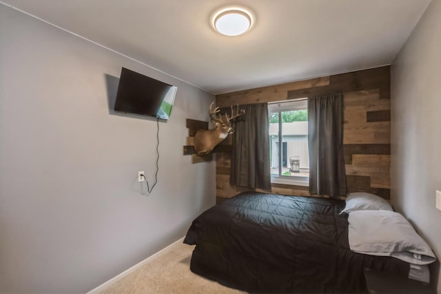 310 SE 3rd St, Panora, IA 50216 - bedroom with carpet and wood walls
