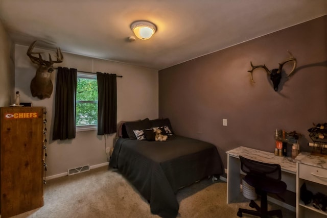 310 SE 3rd St, Panora, IA 50216 - carpeted bedroom featuring baseboards and an office area