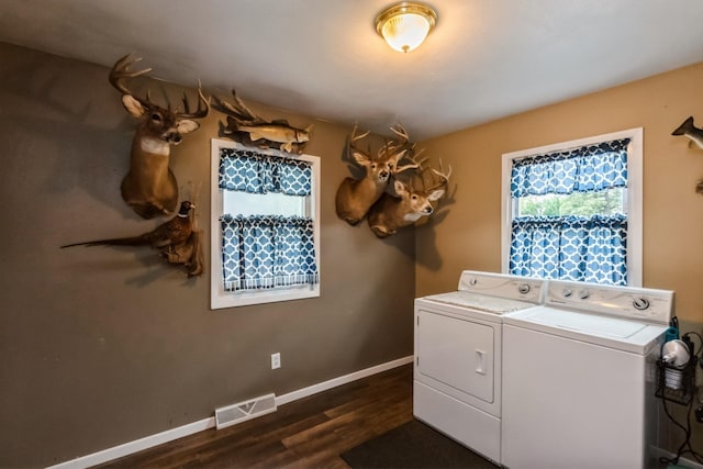 310 SE 3rd St, Panora, IA 50216 - washroom featuring washer and dryer and dark wood-type flooring