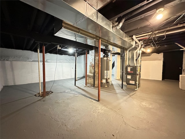 507 W Lincoln Way, Jefferson, IA 50129 - unfinished below grade area with gas water heater and heating unit