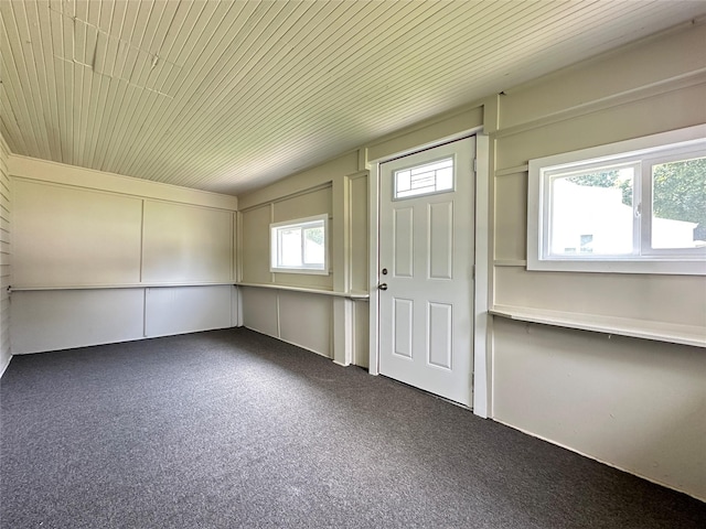 507 W Lincoln Way, Jefferson, IA 50129 - foyer featuring dark colored carpet and wood ceiling