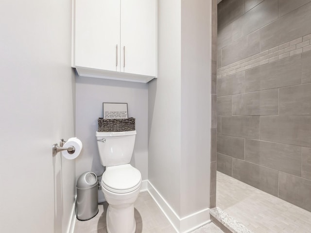 16530 Valleyview Ln, Clive, IA 50325 - bathroom with baseboards and a tile shower