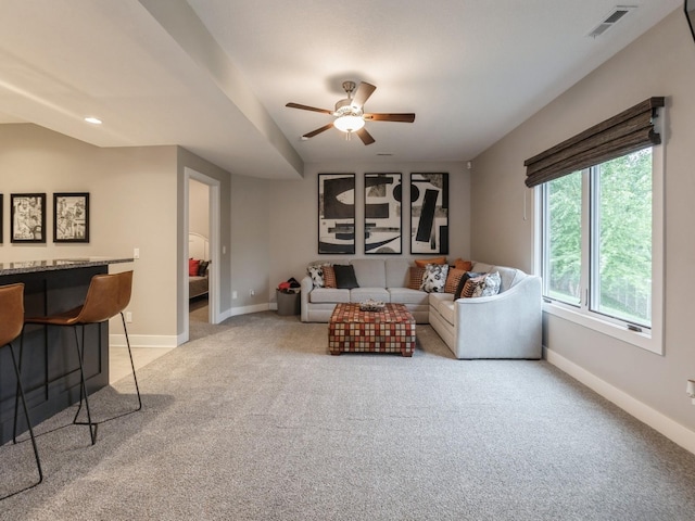 16530 Valleyview Ln, Clive, IA 50325 - living room featuring light colored carpet, ceiling fan, and recessed lighting