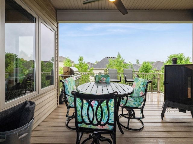 16530 Valleyview Ln, Clive, IA 50325 - deck with a ceiling fan and outdoor dining area