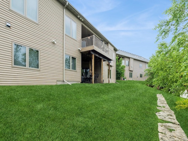 16530 Valleyview Ln, Clive, IA 50325 - rear view of property featuring a balcony and a yard