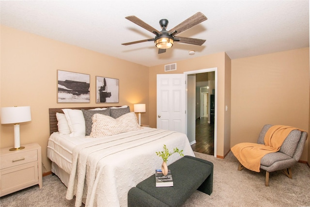 408 Tailfeather Ct NW, Bondurant, IA 50035 - bedroom featuring light colored carpet and ceiling fan