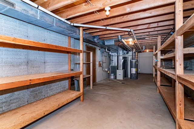 4012 Fletcher Blvd, Ames, IA 50010 - unfinished below grade area featuring gas water heater and heating unit