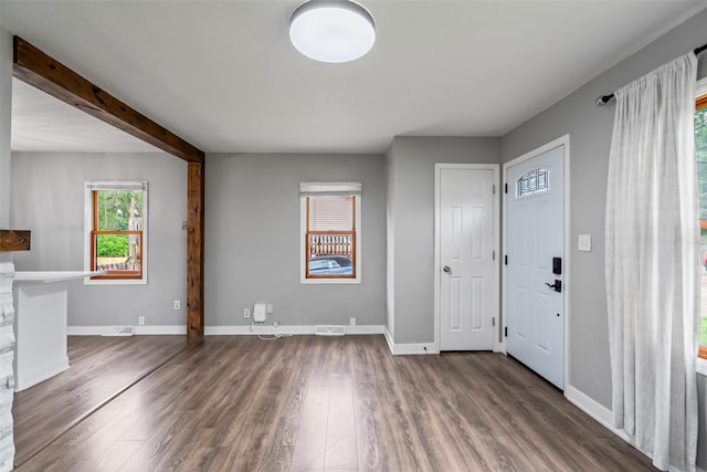 1115 E Herold Ave, Des Moines, IA 50315 - foyer entrance with dark wood-style floors and baseboards