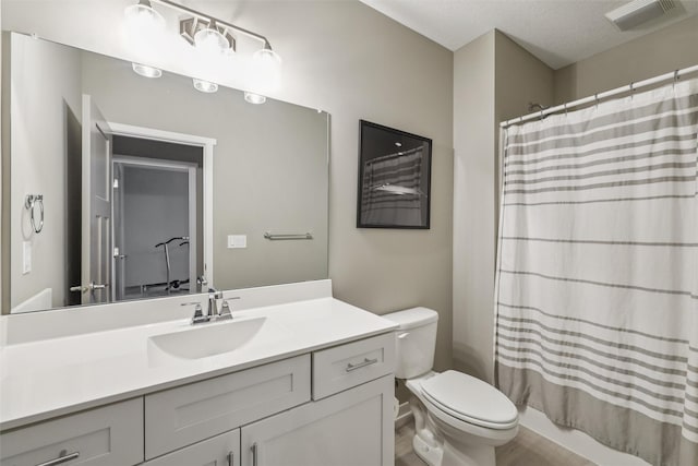 10214 Thorne Dr, West Des Moines, IA 50266 - bathroom with toilet and vanity
