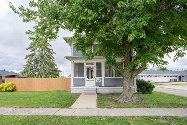 314 E 3rd St N, Newton, IA 50208 - view of front of property featuring a sunroom