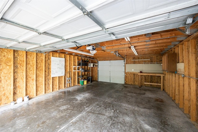 1144 57th St, Des Moines, IA 50311 - garage featuring a garage door opener
