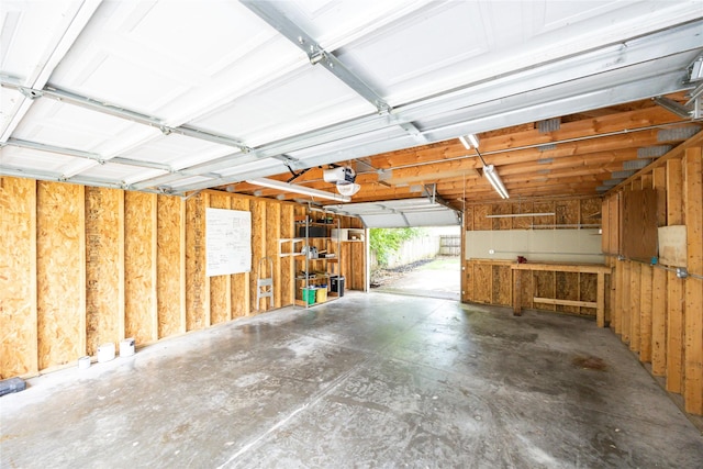 1144 57th St, Des Moines, IA 50311 - garage featuring a garage door opener