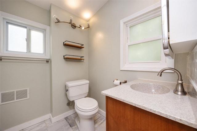 1144 57th St, Des Moines, IA 50311 - bathroom with vanity and marble finish flooring