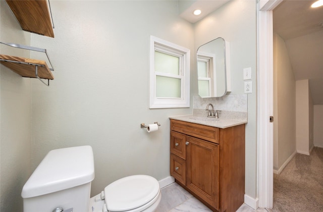 1144 57th St, Des Moines, IA 50311 - bathroom featuring vanity and recessed lighting