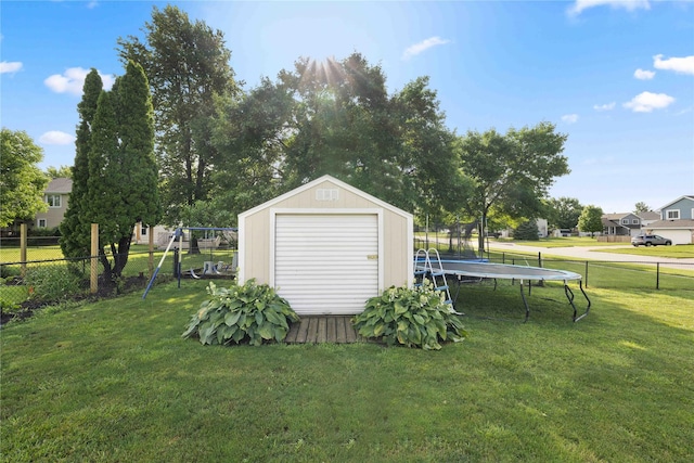1215 7th Ave SE, Altoona, IA 50009 - view of yard with a trampoline and a storage shed