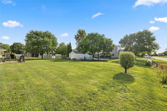 1215 7th Ave SE, Altoona, IA 50009 - view of yard featuring a trampoline and a shed